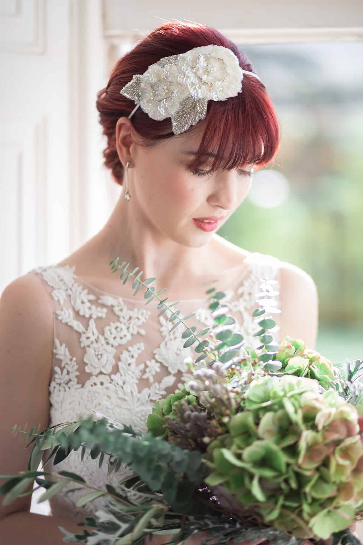 Bride wearing white floral headband