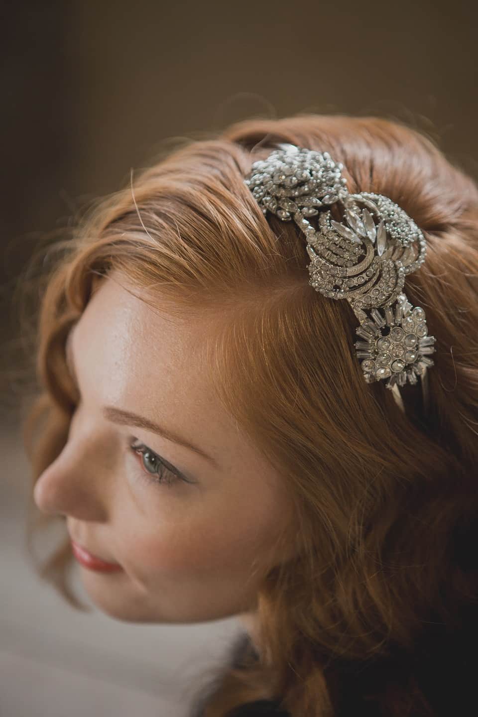 Bride wearing nature-inspired silver headpiece