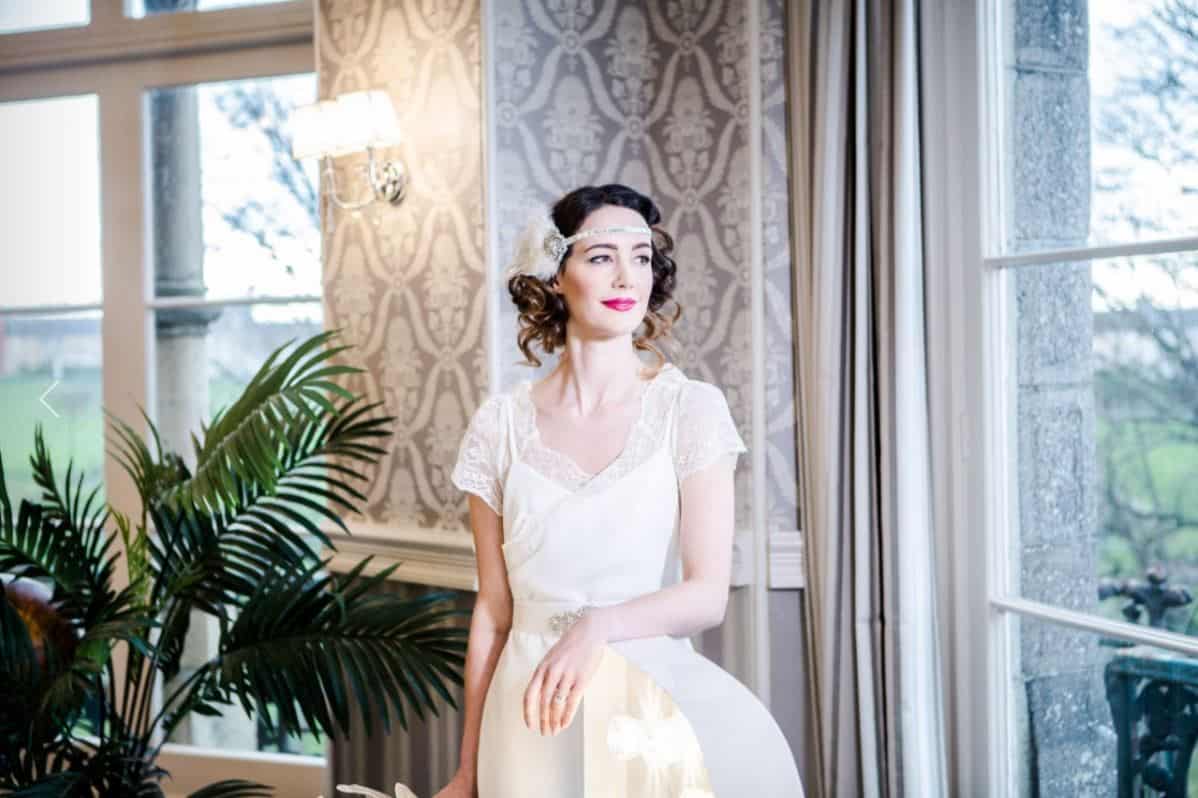 Smiling bride in 20s style wedding dress