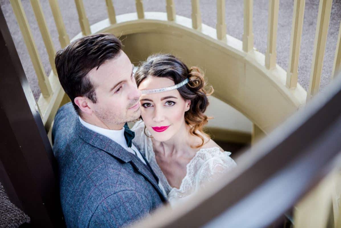 Bride and groom at Duke of Cornwall Hotel photoshoot with 1920s bridal make-up